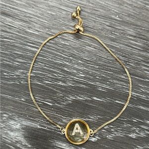 “A” Initial Bracket